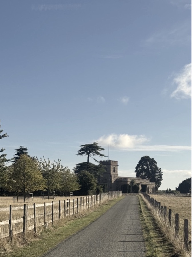 The lane to Little Gaddesden church, between wooden fences